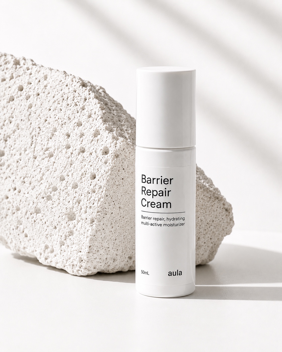 Barrier Repair Cream beside pumice stone
