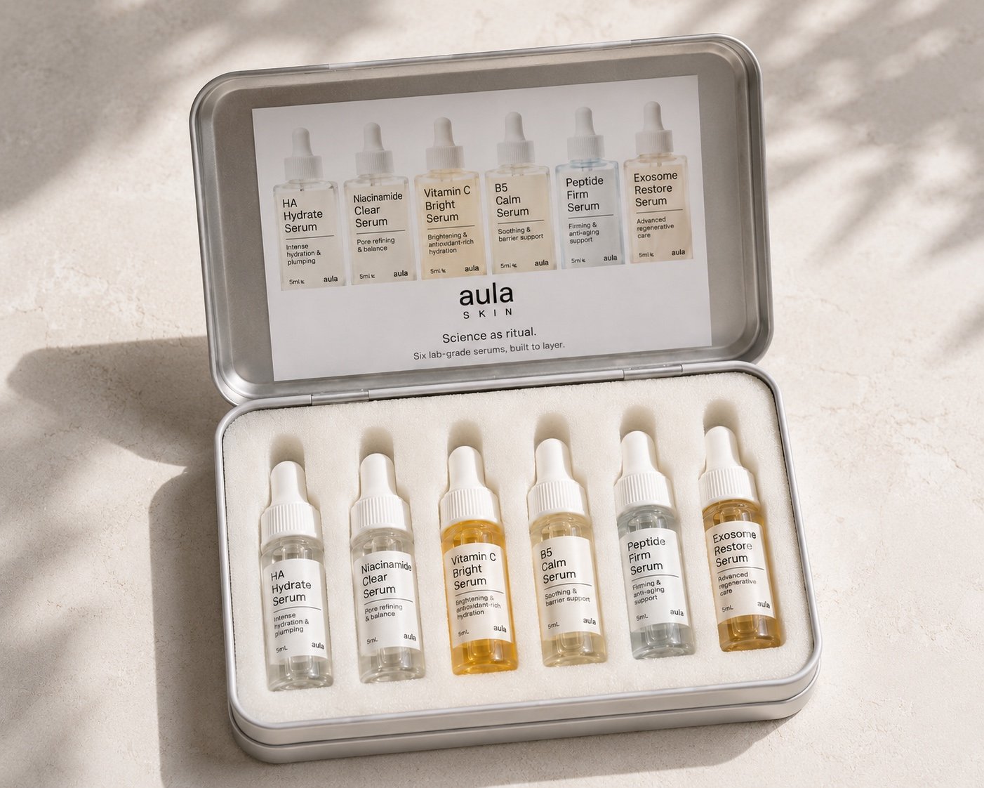 Open Aula Discovery Set tin with all six 5 mL serum minis seated in the foam